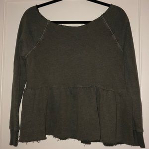 out from under olive green sweatshirt